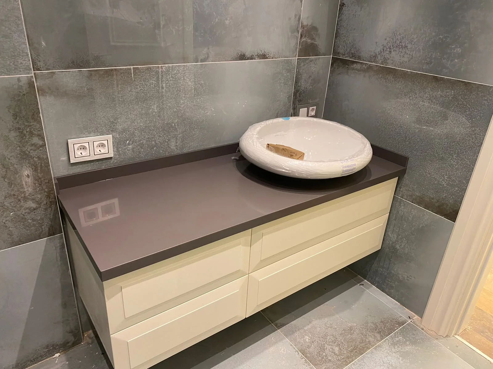 Bathroom countertop and vanity installation — image 08