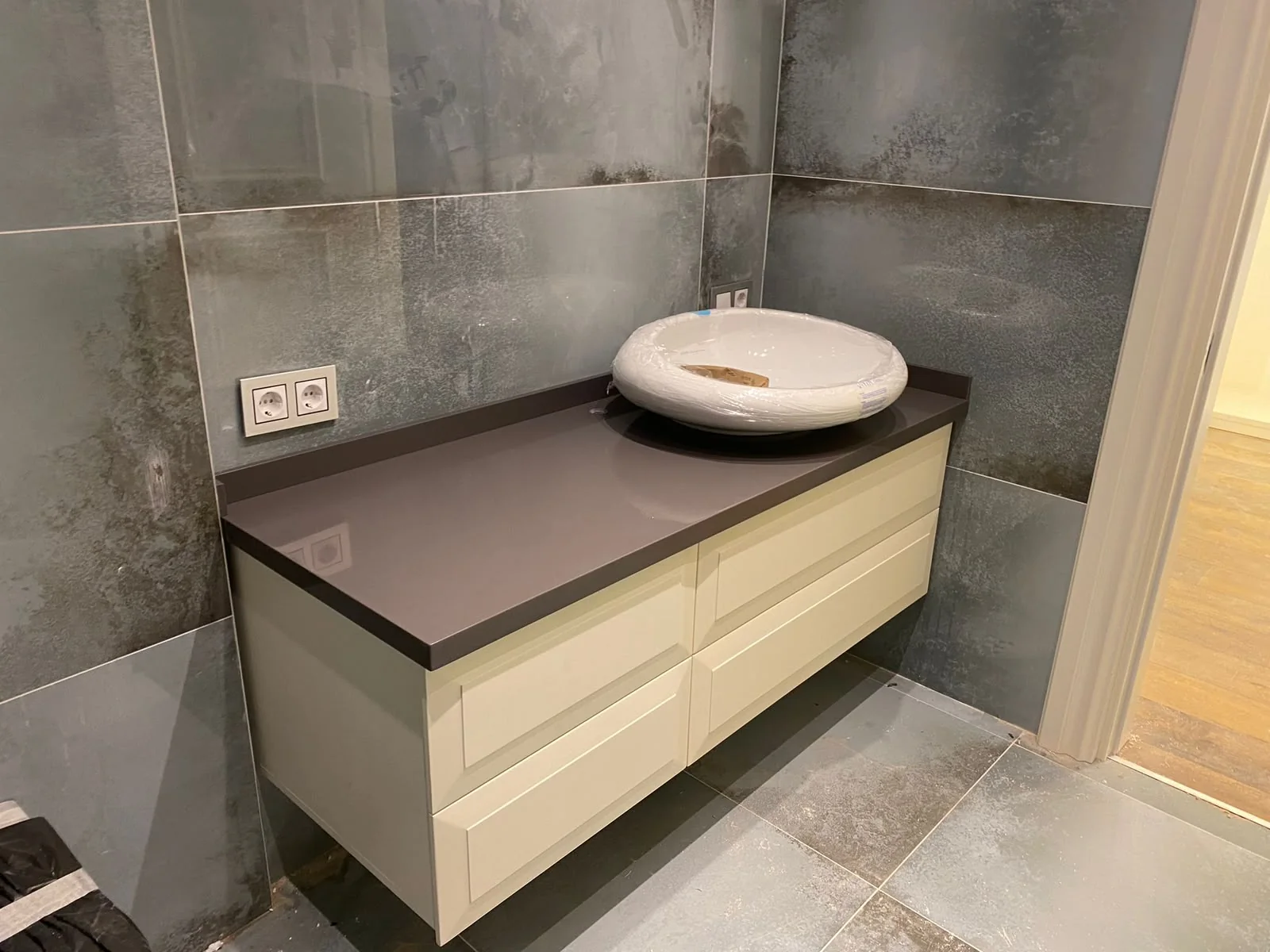 Bathroom countertop and vanity installation — image 10