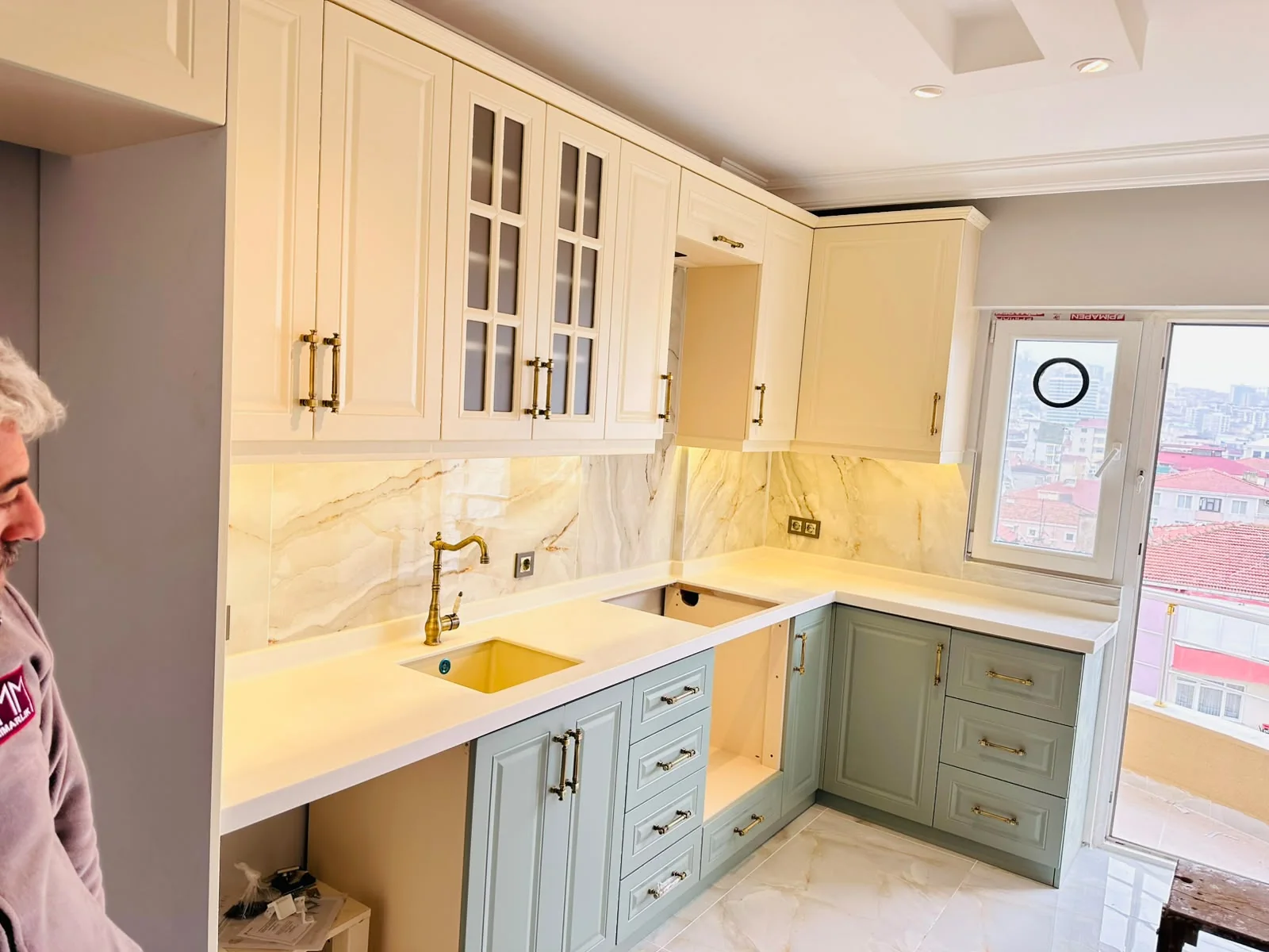Light-coloured kitchen countertop and sink