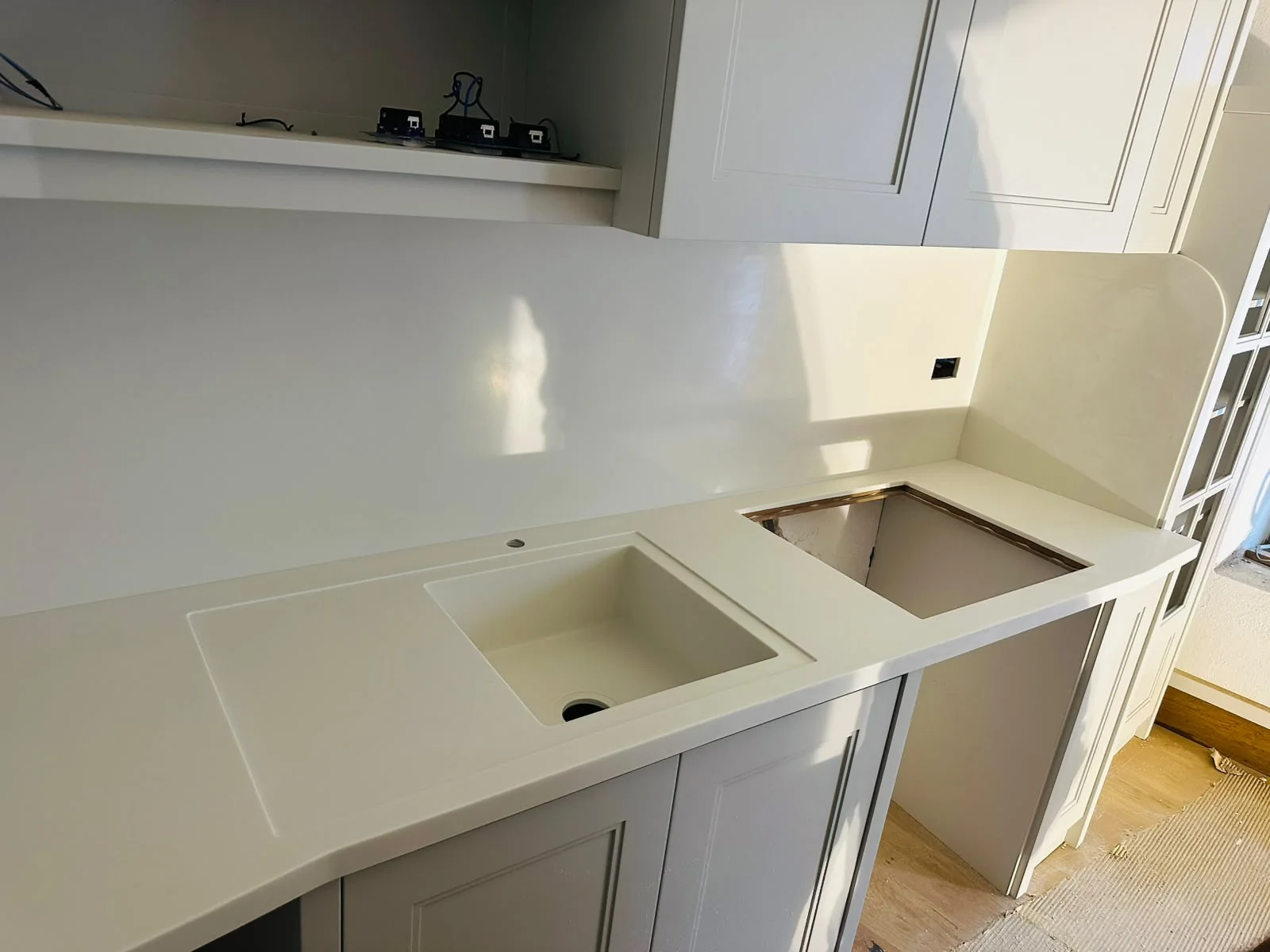 Kitchen surface with sink and workspace