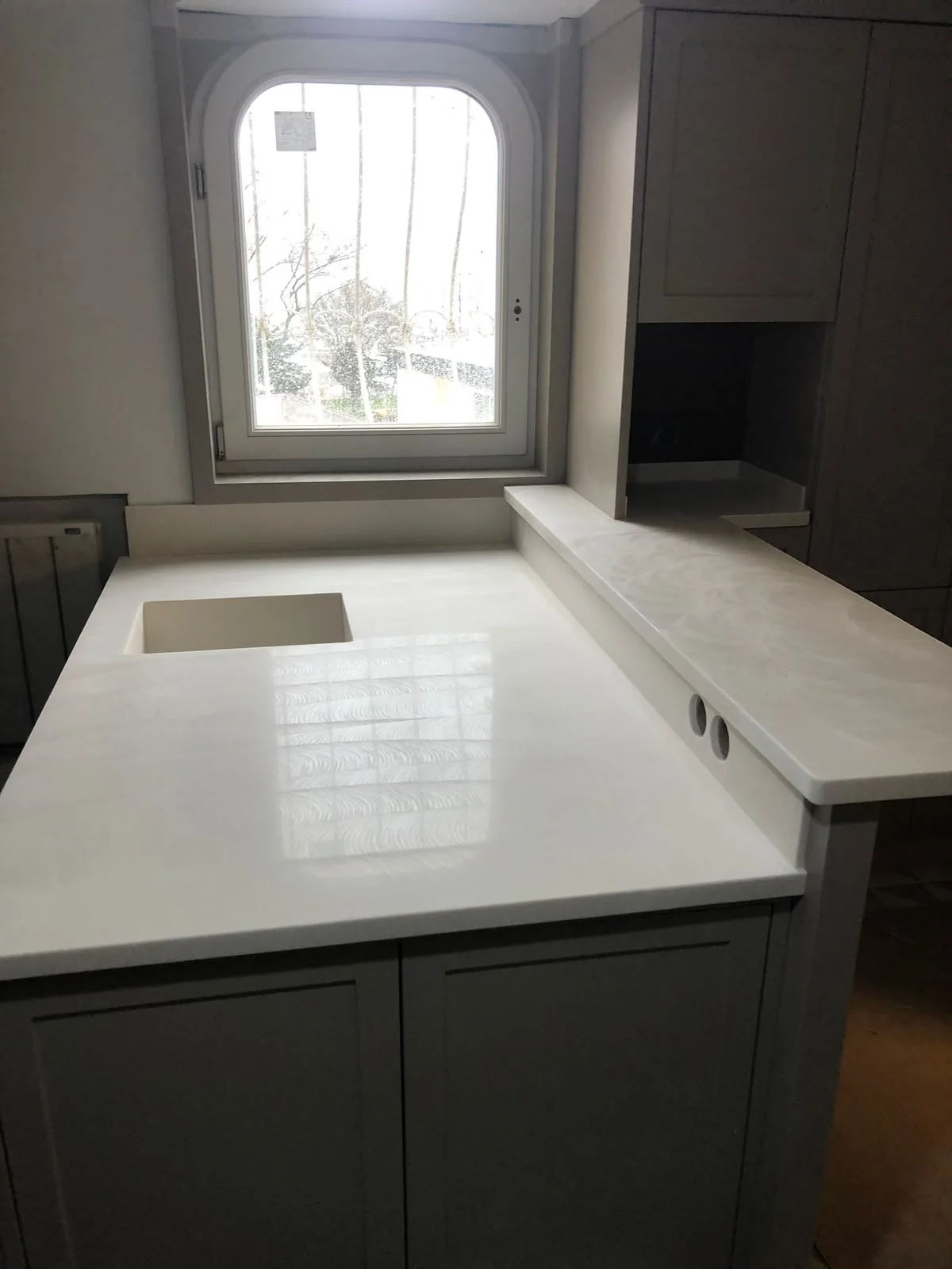 Light kitchen surface by a window